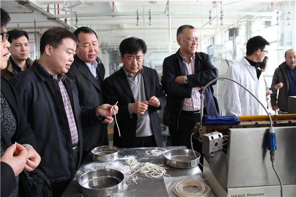 京粮集团王建新副总经理一行来校考察交流